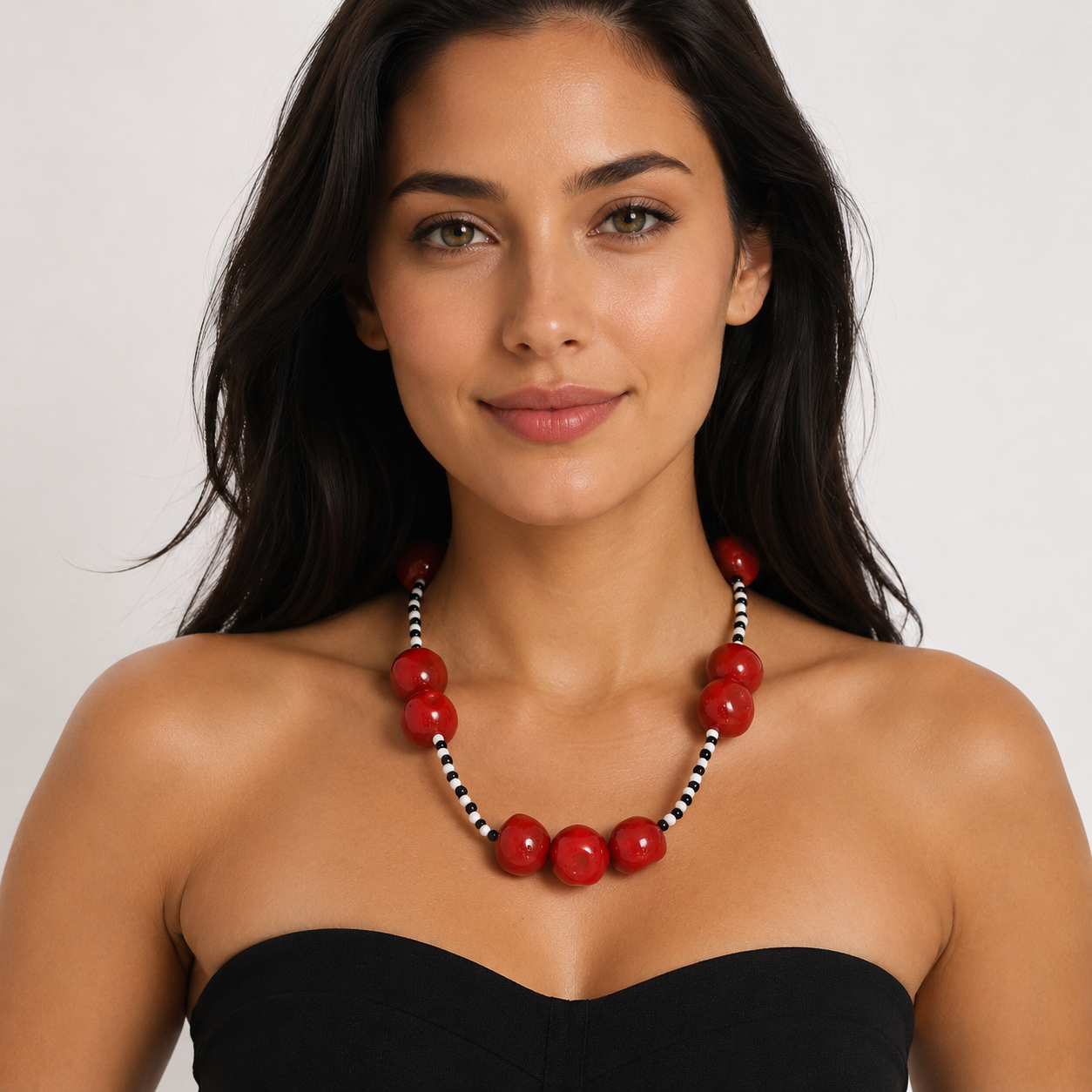 Red_beaded_statement_necklace_worn_by_woman